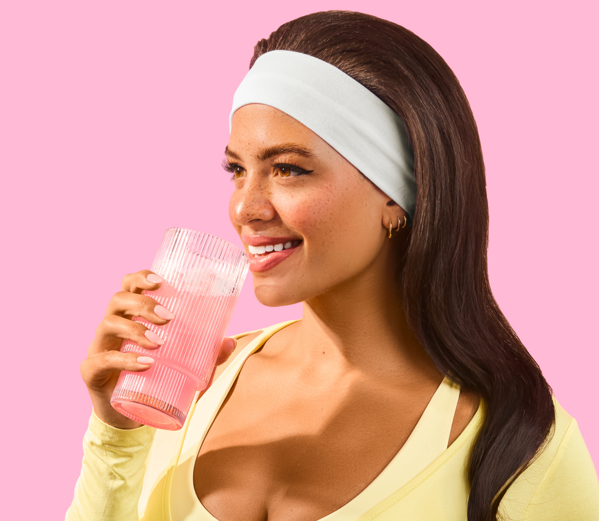 Hands holding Bloom Clear Protein bag
